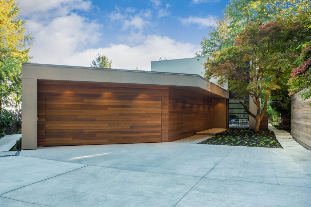 Clean lines and minimalist facades are often mid-century house exterior design.