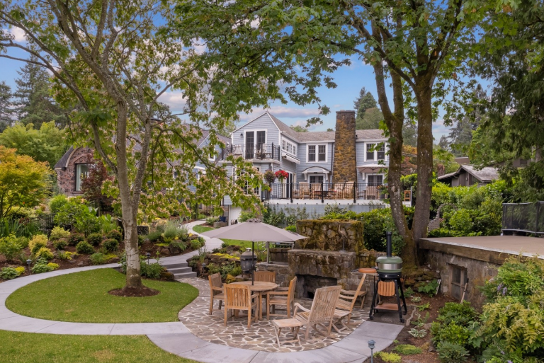 A luxury home featuring an outdoor space in a garden