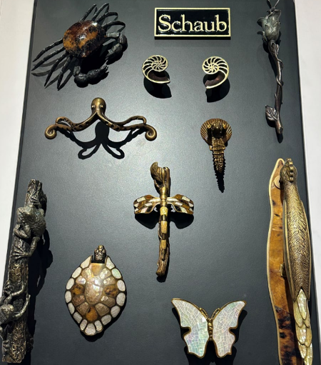 A collection of unique hardware for cabinets, including a crab, octopus, turtle shell, frogs, and more.